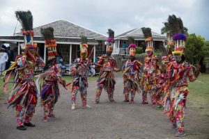 Prince Harry was given a farewell from Brimstone Hill by masqueraders dancing.