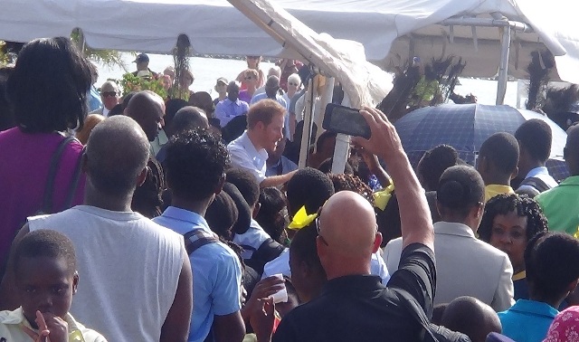 PRINCE HARRY WOWS NEVISIAN CROWD