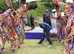 Prince Harry Moves with the Traditional Masqueraders