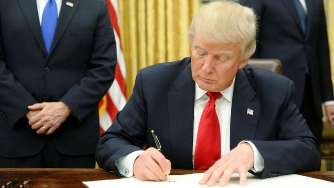 President Trump begins overhaul as first executive orders signed