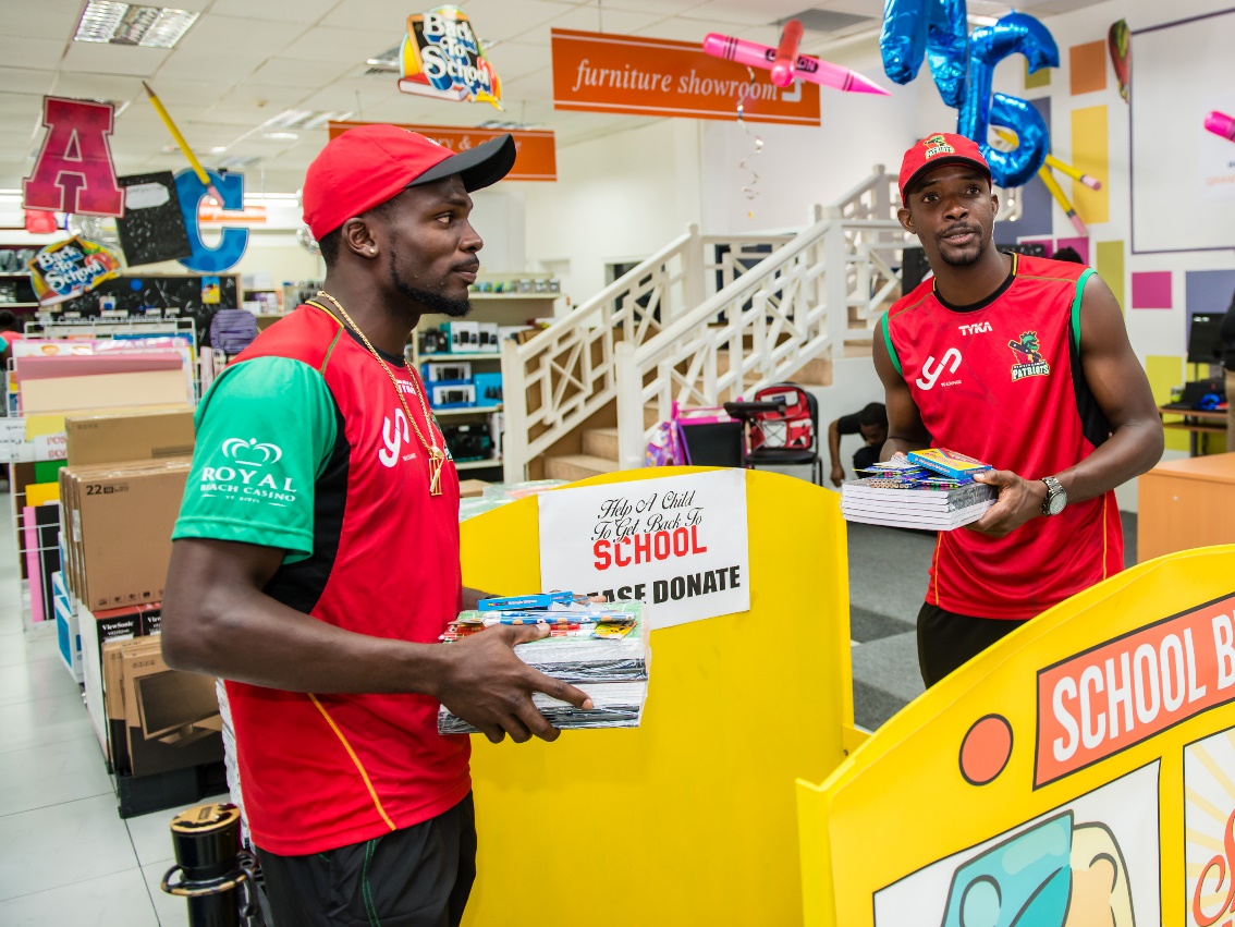 SKN Patriots Team Members support TDC ‘Shop and Share’ Initiative