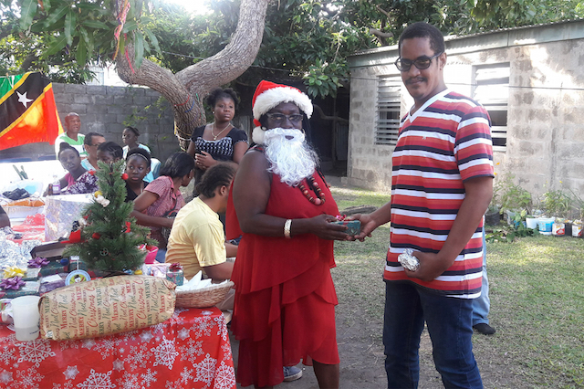 Santa Claus’ wore a dress at Ade’s Place’s Christmas party