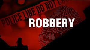 Passenger bus crashes during robbery
