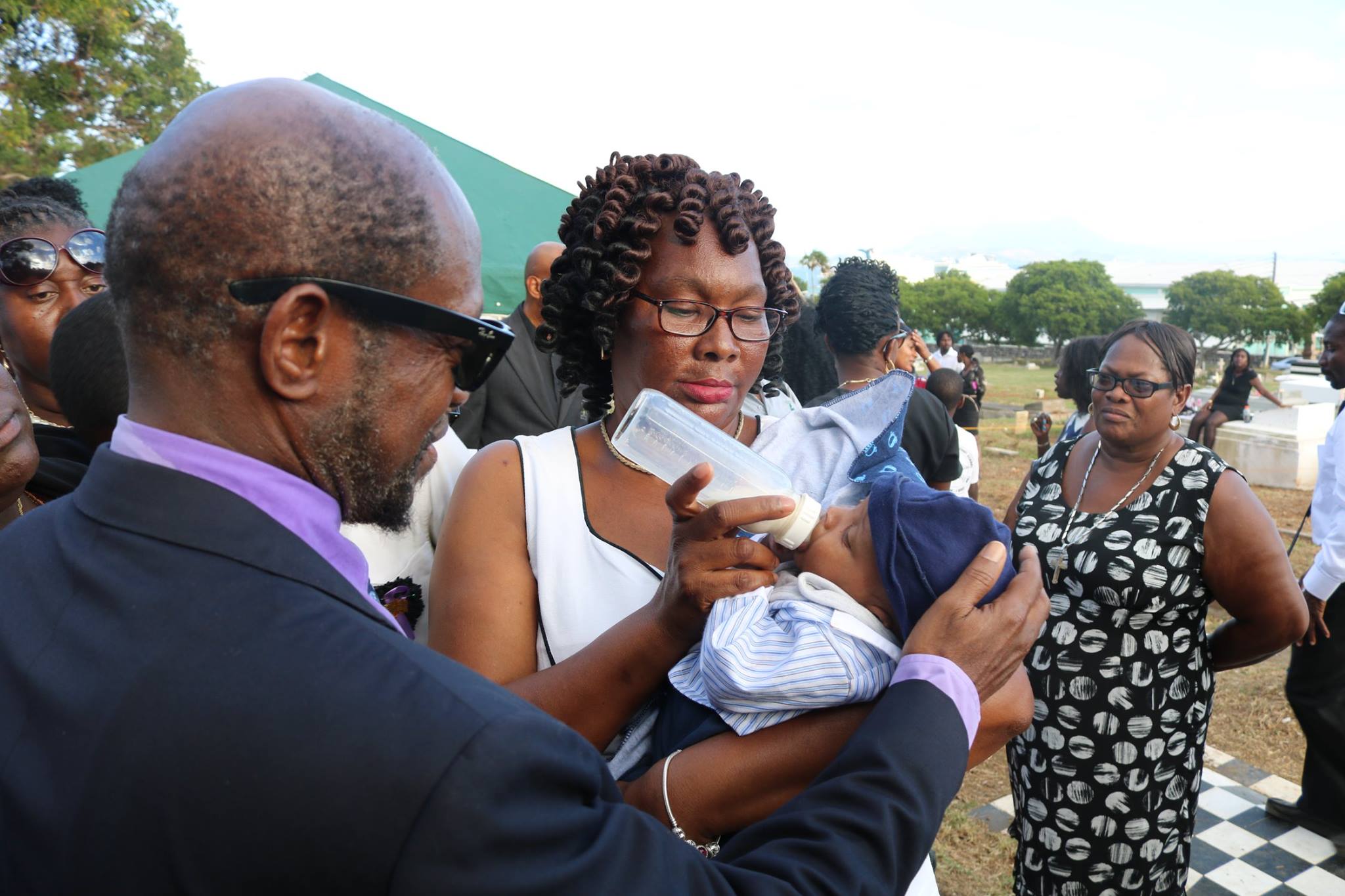 Dr. Douglas makes promise to two-  month old son of Jimmyliah Finch