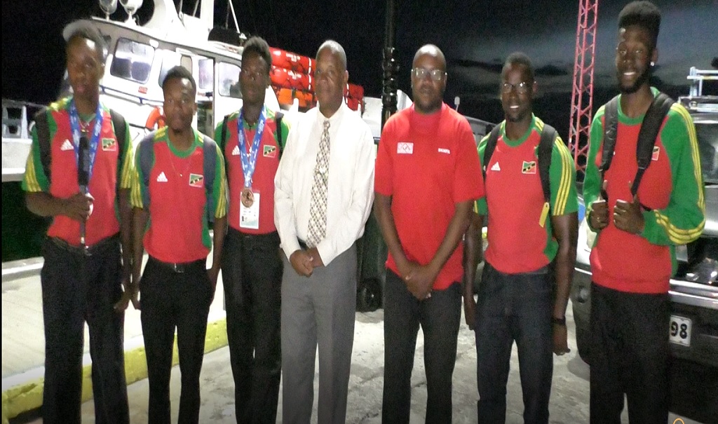 Minister Evelyn Welcomes Home CARIFTA Contingent