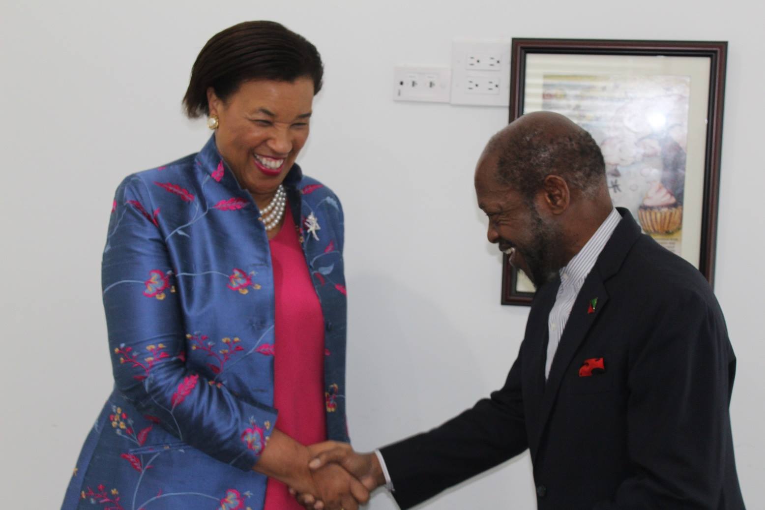Baroness Scotland pays courtesy call on  Opposition Leader Dr. Denzil Douglas
