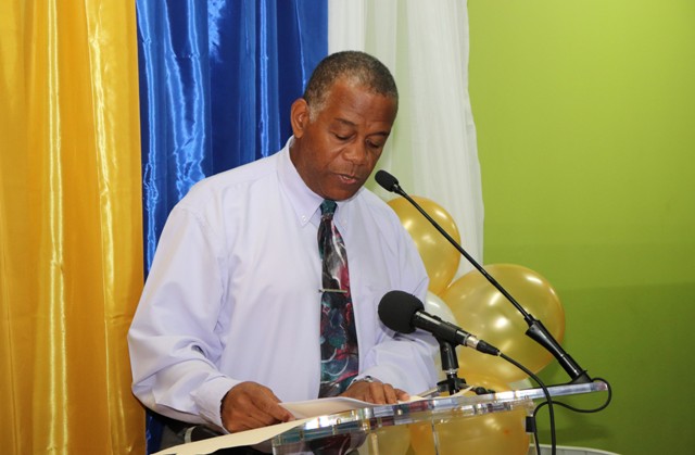 Minister Evelyn pays tribute posthumously to former senior Customs officer Brian David