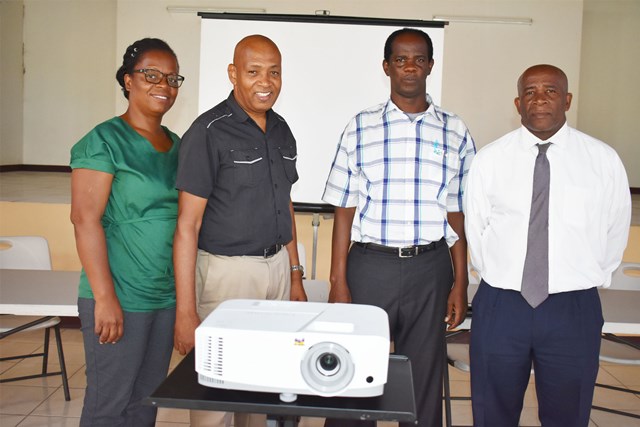 Dr Chitan empowering Nevis STEP environmental workers through social skill training