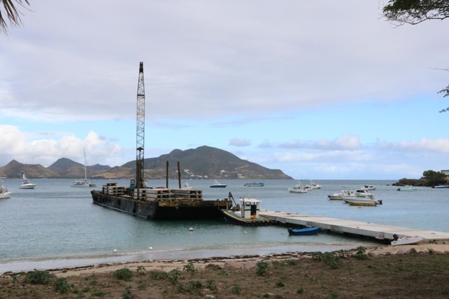 Work resumes on construction of new water taxi pier at Oualie Bay with longer wharf