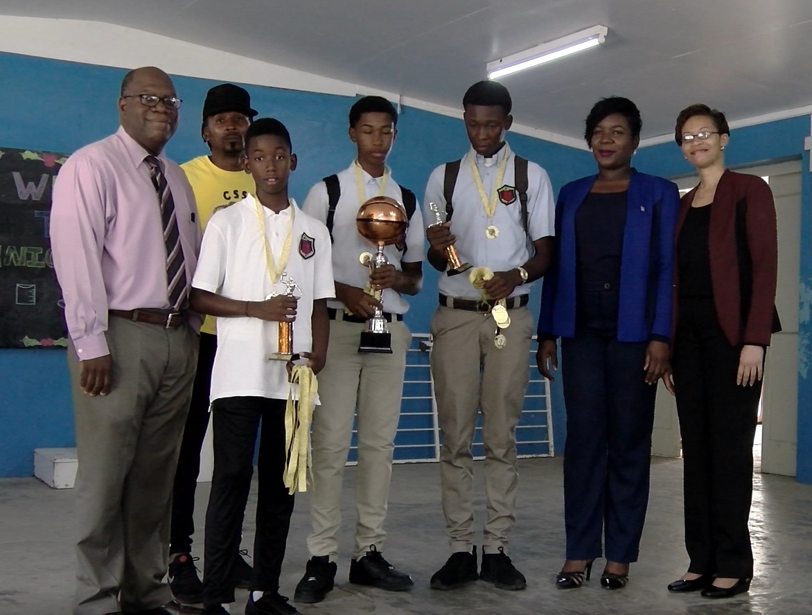 High Schools Receive Trophies and Medals from Basketball Tournament