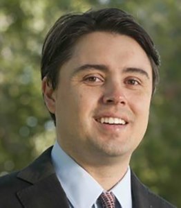 High Court judge rules arrest of American political consultant unlawful; awards substantial amount