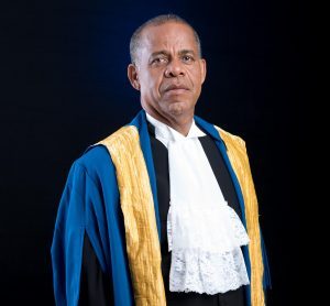 The Hon. Justice Denys Barrow