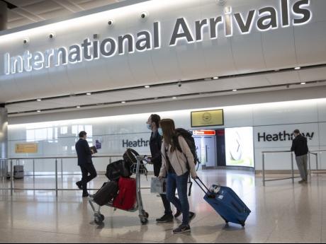 Howls Of Protest As UK Starts 14-Day Quarantine For Arrivals