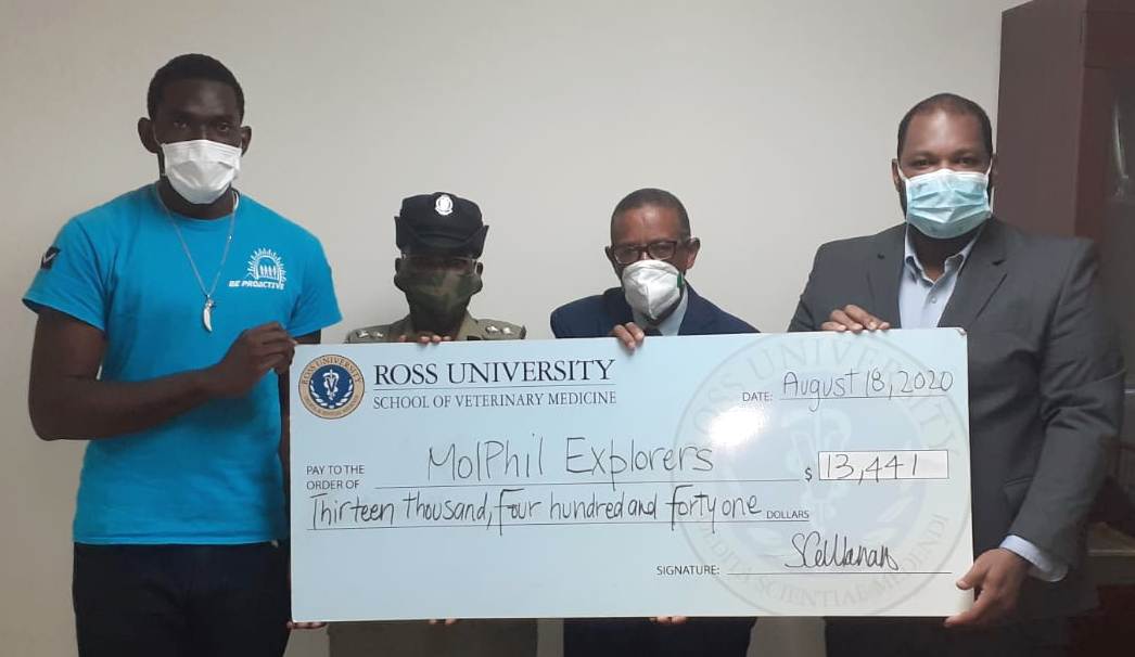 Ross University Donates Over $13,000 to Explorers Club to Support Youth Development