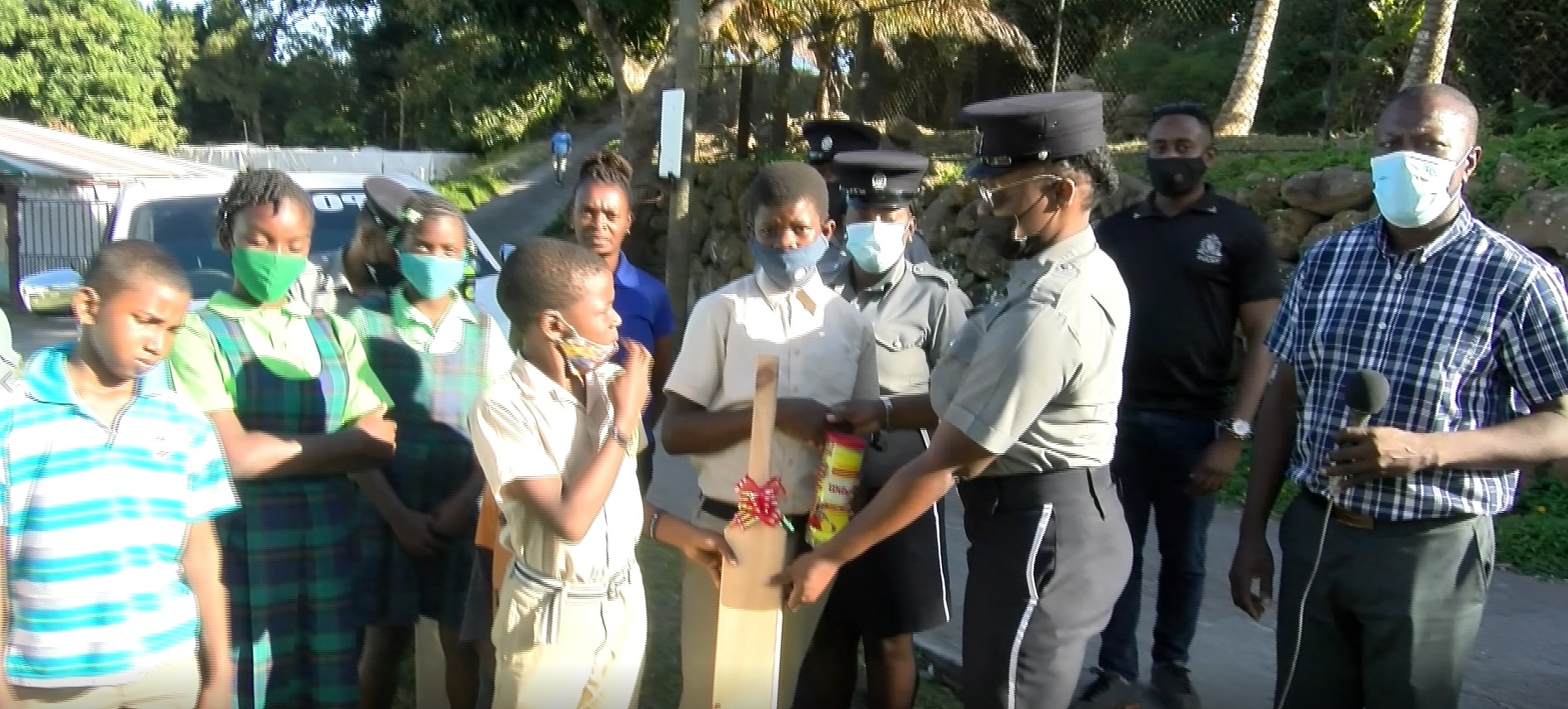 Police Officers Donate Cricket Gear in True Community Spirit