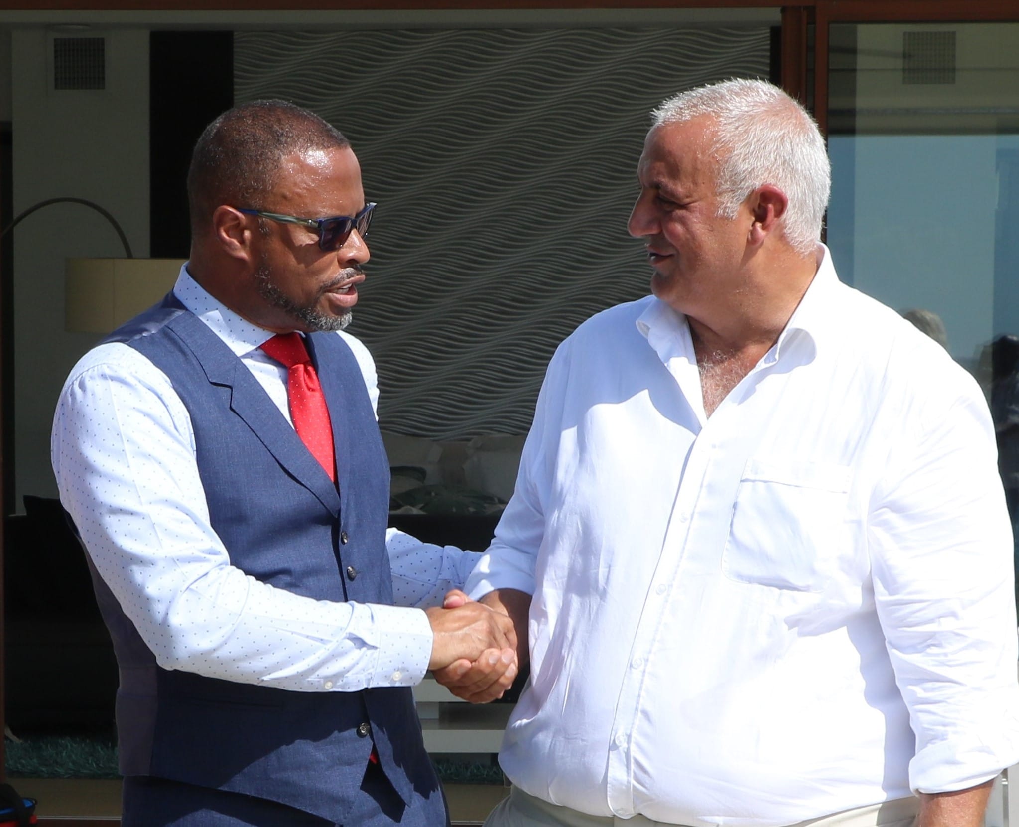 Premier Mark Brantley signs an historic 3-year movie deal for Nevis
