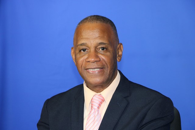 Hon. Eric Evelyn congratulates St. Kitts and Nevis Olympians