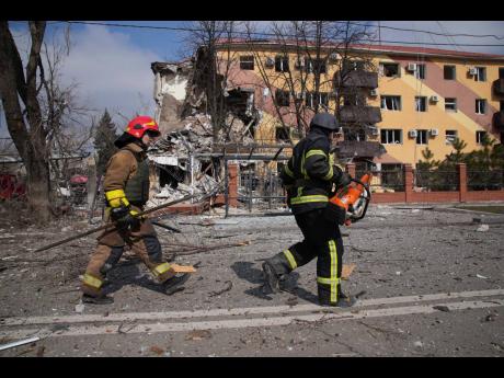 Russians keep pressure on Mariupol after hospital attack