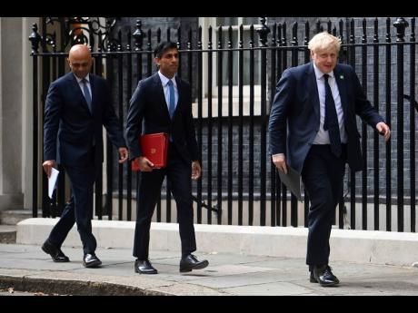 Two key Cabinet ministers quit Boris Johnson’s gov’t