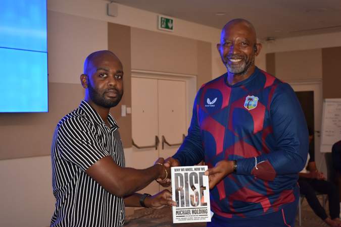 West Indies Players Receive Copies of Michael Holding’s “Why We Kneel, How We Rise”