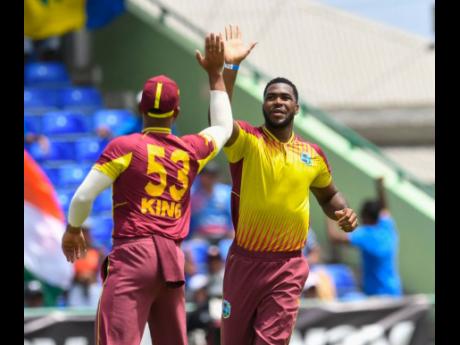McCoy, King help Windies level series