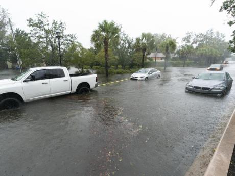 Hurricane Ian lashes South Carolina as Florida surveys devastation