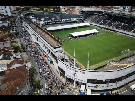 Fans mourn Pelé at public viewing in Brazil stadium