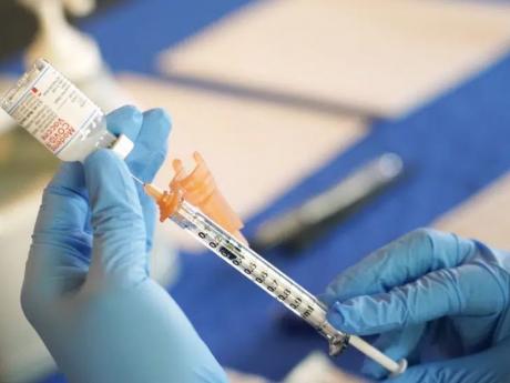 US proposes once-a-year COVID shots for most Americans