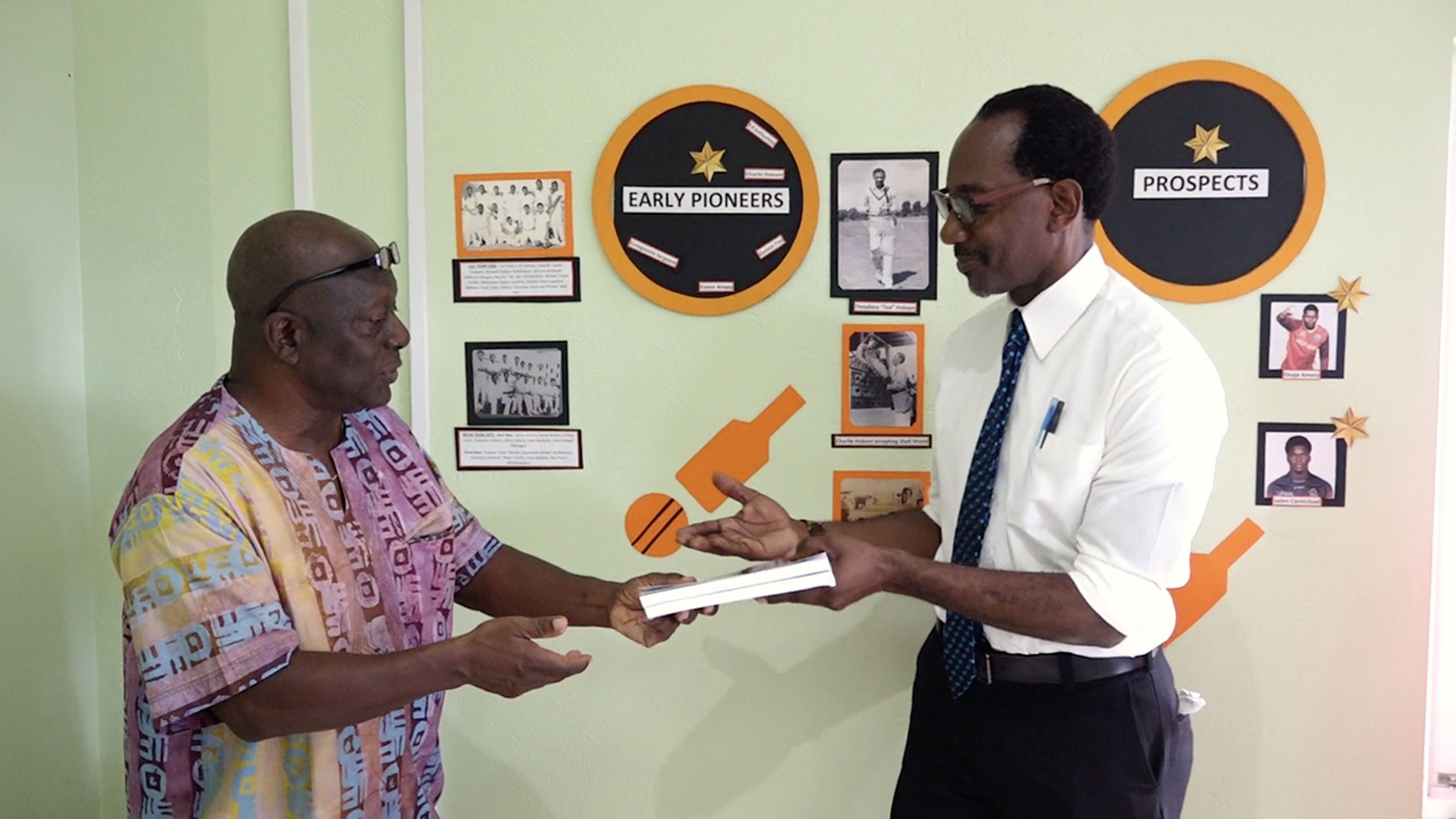NIA official expresses gratitude for donation of books to public library, sports museum featuring Elquemedo T. Willett’s cricketing prowess, 78 years of Nevis’ cricket history