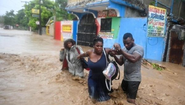 Torrential Rains Leave 15 Dead and 8 Missing in Haiti