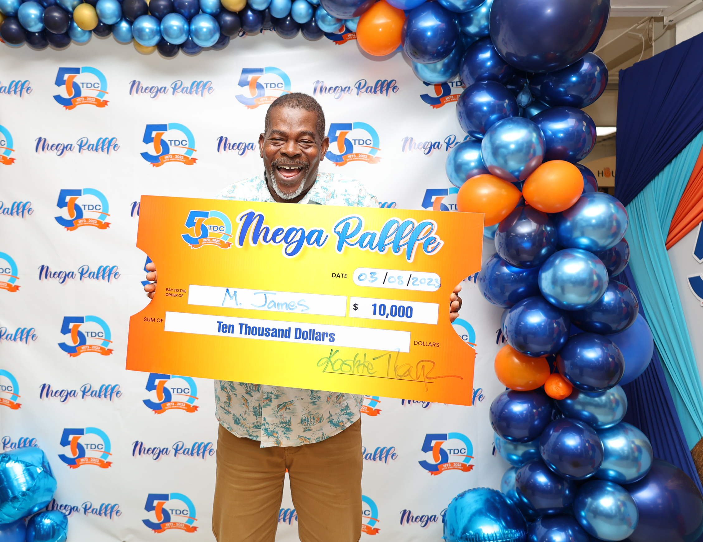 Lucky Couple wins $10,000 in the first TDC 50K Mega Raffle Draw