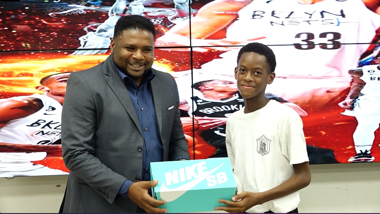 Minister Of Sports Thanks NBA Star Nicolas Claxton for Donating Several Dozen Pairs of Sneakers to Students on Nevis