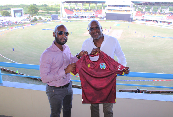 President Shallow Presents Special West Indies Maroon Macron Jersey to Minister Matthew
