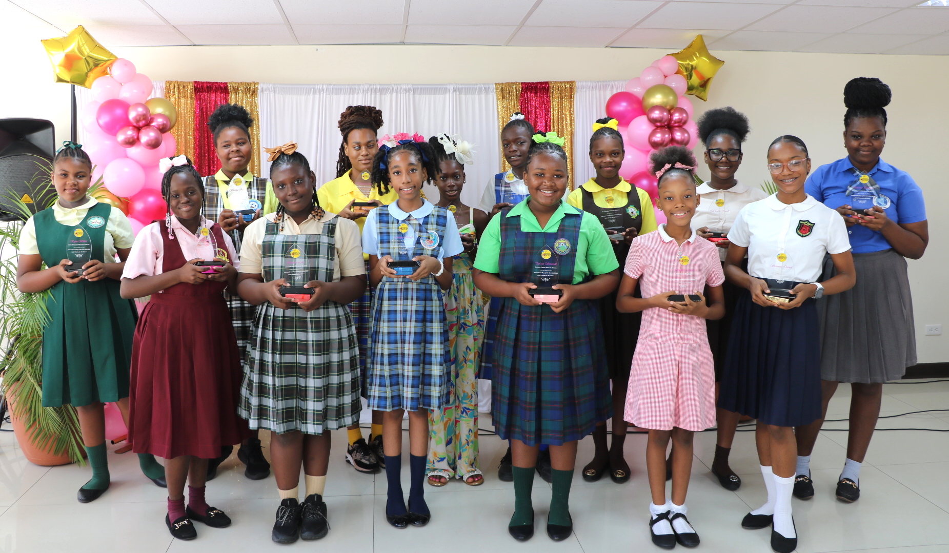 Fourteen Students on Nevis Recognized with the Girl of Excellence Award for 2024