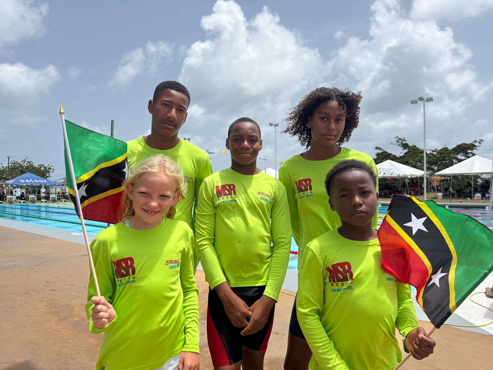 Bring It! Swim Team Shines at Regional Meet in Barbados
