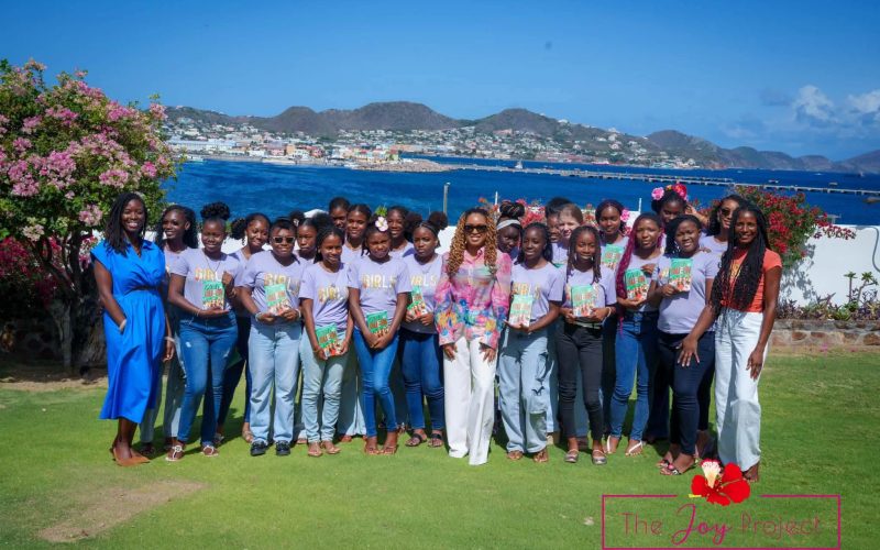 The Joy Project and Girls Illuminated St. Kitts & Nevis Guide Young Girls on Financial Literacy