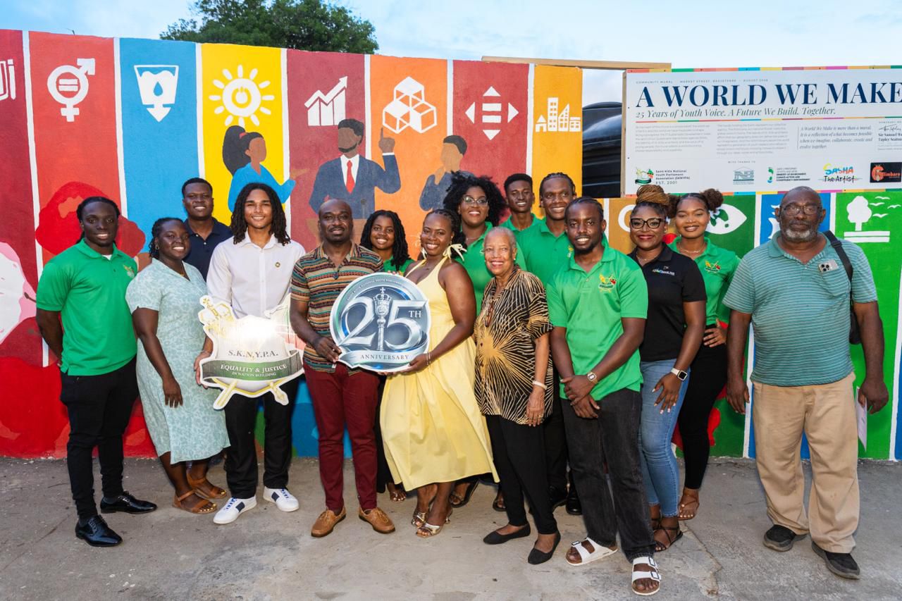Minister Phillip Commends SKNYPA for Community Mural Promoting Sustainability and Collective Action