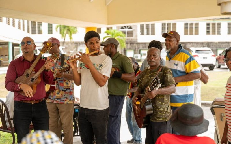 Honey Bees String Band Brings Joy and Fellowship to Residents of Flamboyant Nursing Home in Celebration of Seniors Month